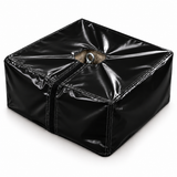 Housse PVC noire sur bloc de lest en béton, avec ouverture pour l'anneau de levage